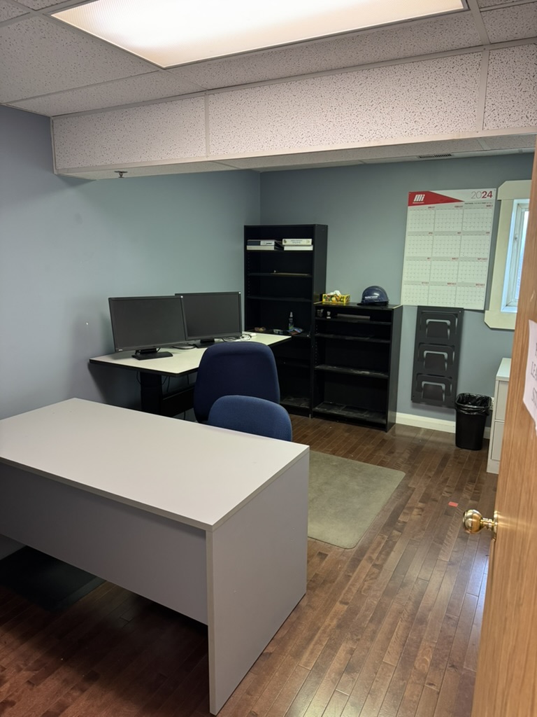 Private office at The Corner Coworking Charlesworth with single desk and filing cabinet storage