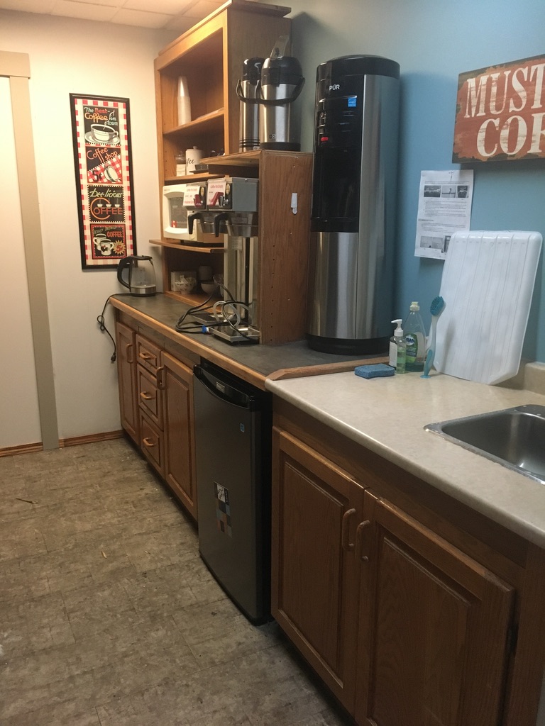 Member kitchen at Charlesworth Ave The Corner Coworking with coffee station and amenities