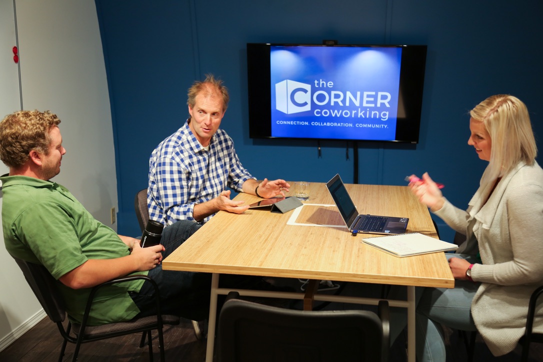 Collaborative discussion in The Corner Coworking boardroom